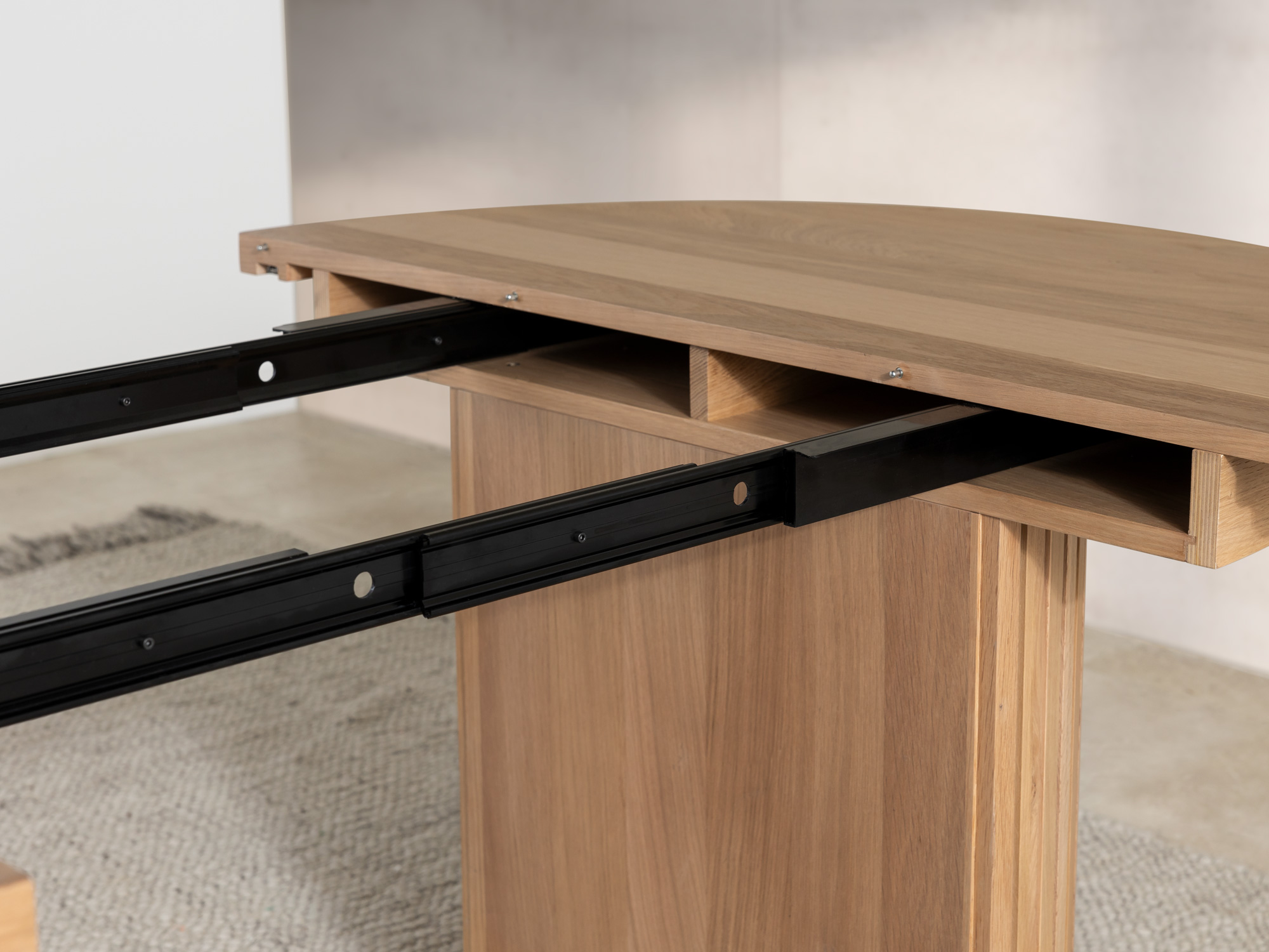 transformer-round-table-scandinavian-oak-mechanism-close-up-lifestyle.jpg